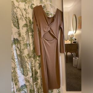 Ribbed long sleeve, fitted dress. Back-cut out. Wear forwards and backwards